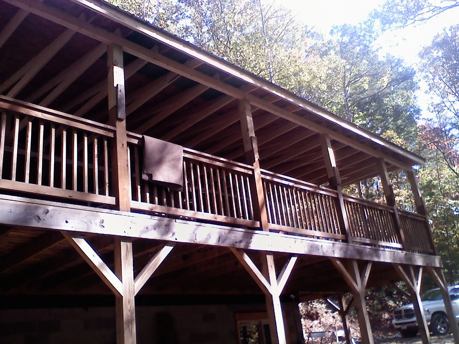Timber framing under a new elevated porch and deck — Roof Leak Repair in Mercer Island by Roofing Brothers